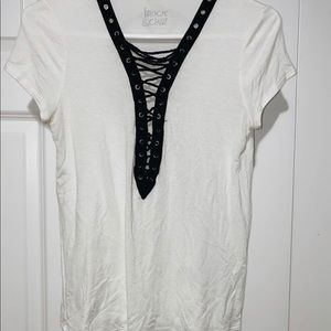 White top with cross cross